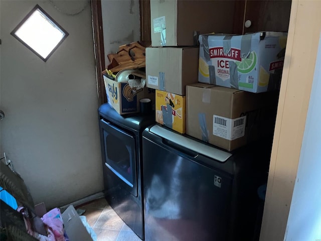 washroom featuring washing machine and dryer
