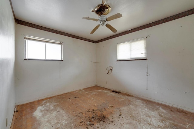 empty room featuring ceiling fan