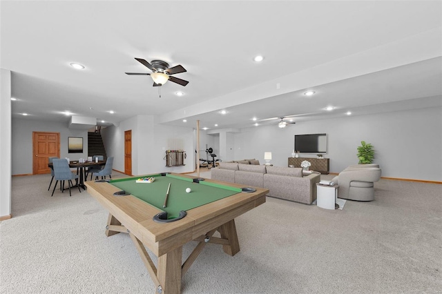 recreation room with light colored carpet, ceiling fan, and billiards