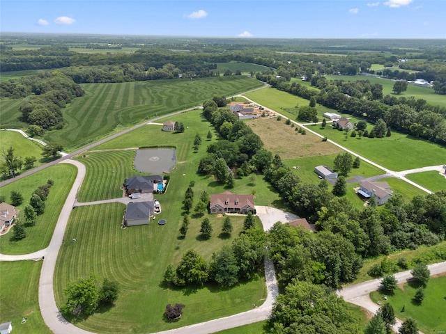 birds eye view of property featuring a rural view