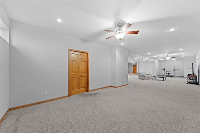 interior space with ceiling fan