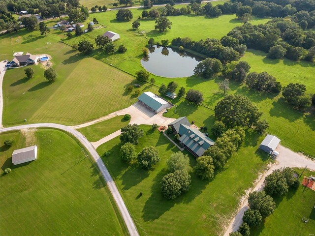 bird's eye view featuring a water view and a rural view