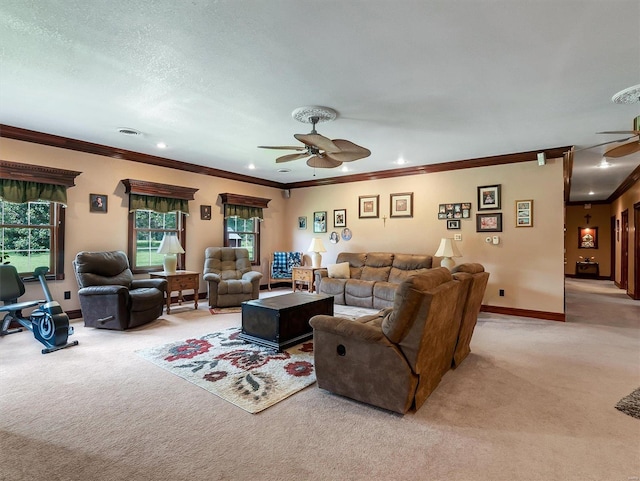 carpeted living room with crown molding, a textured ceiling, and ceiling fan