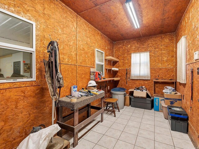 interior space with light tile patterned floors