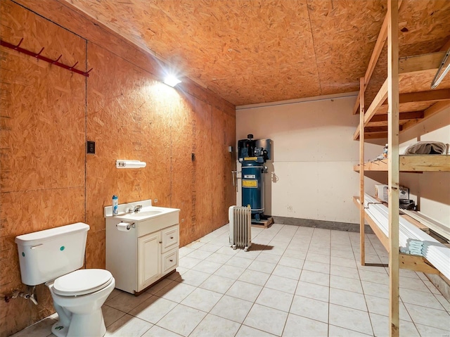 bathroom with vanity, tile patterned floors, and toilet