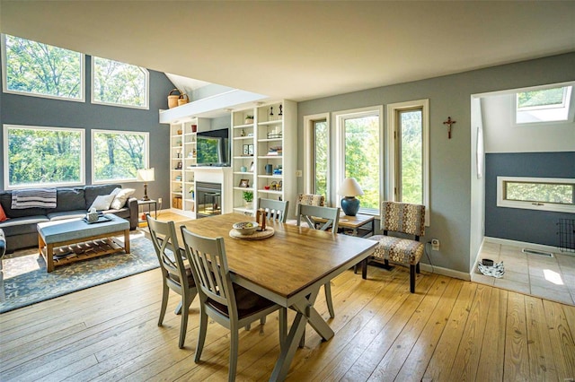 dining space featuring light hardwood / wood-style floors