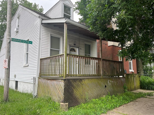 view of home's exterior with a porch