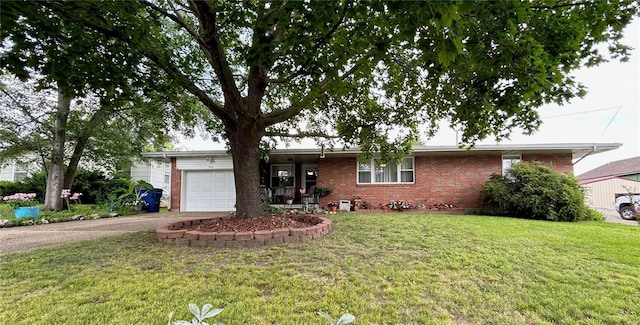 ranch-style house with a garage and a front lawn