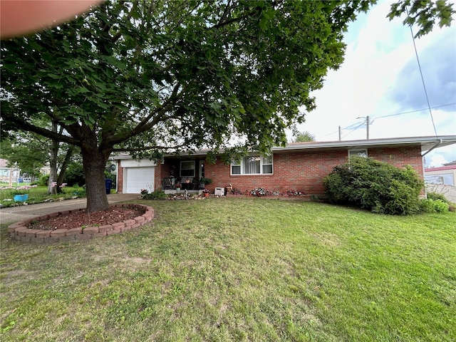 single story home with a garage and a front lawn