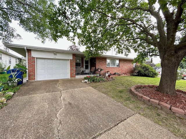 ranch-style home featuring a garage, a front lawn, and a porch