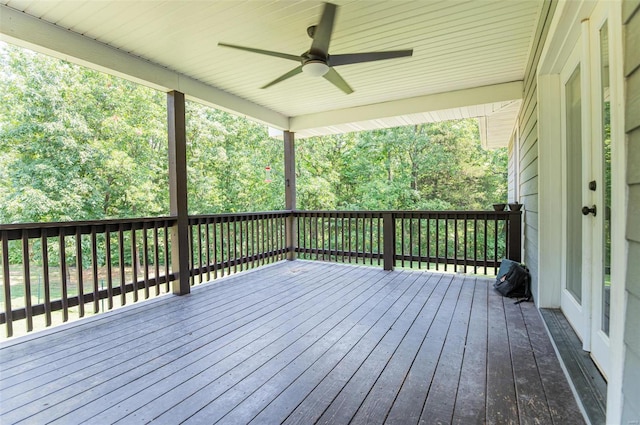 wooden terrace featuring ceiling fan