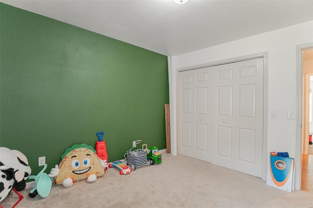 recreation room with carpet floors