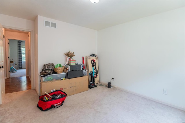 recreation room with hardwood / wood-style flooring