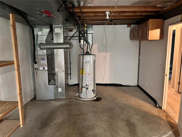 basement featuring gas water heater and heating unit