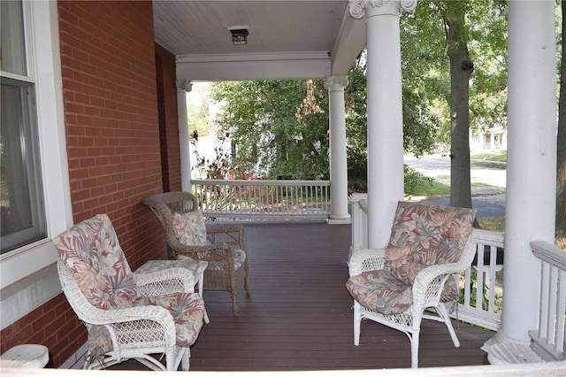 wooden terrace featuring a porch