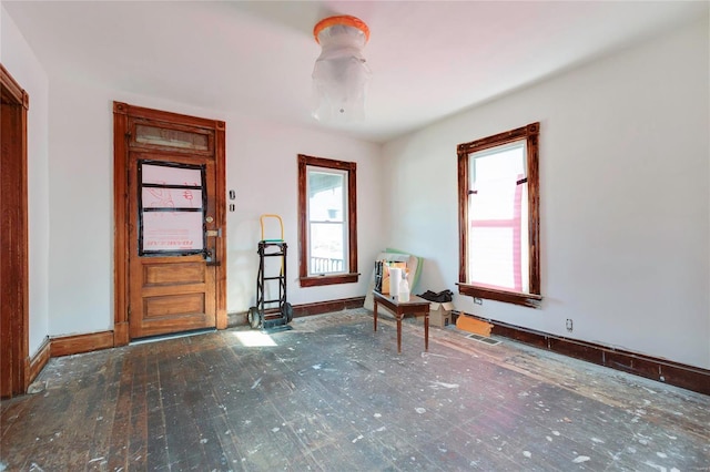 entryway with a healthy amount of sunlight and baseboards