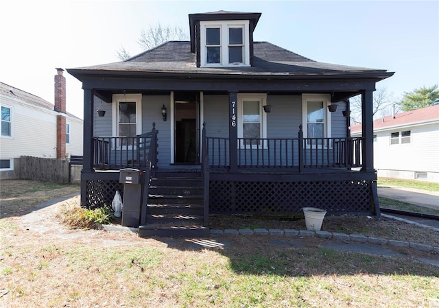 bungalow featuring covered porch