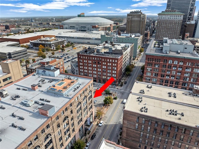 birds eye view of property featuring a city view