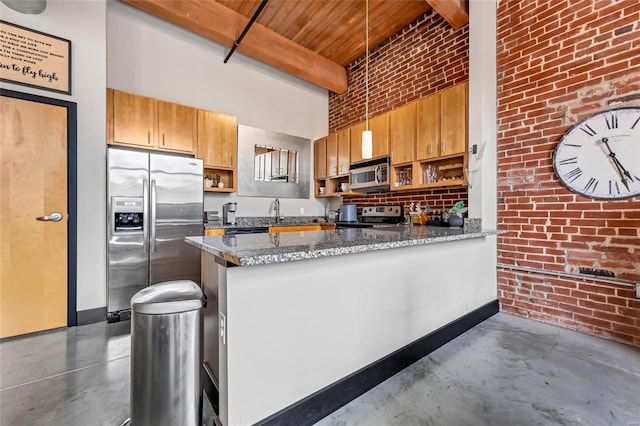 kitchen featuring brick wall, stainless steel appliances, and open shelves