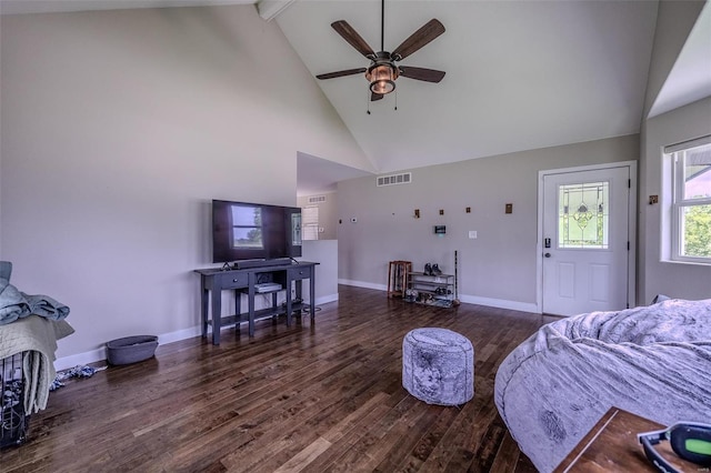 living room with dark wood-type flooring, beam ceiling, high vaulted ceiling, and ceiling fan