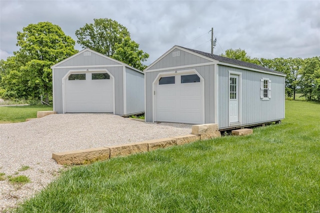 garage featuring a yard