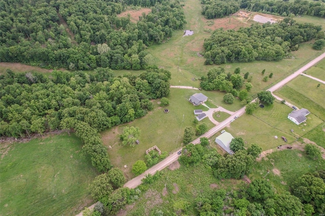 birds eye view of property featuring a rural view