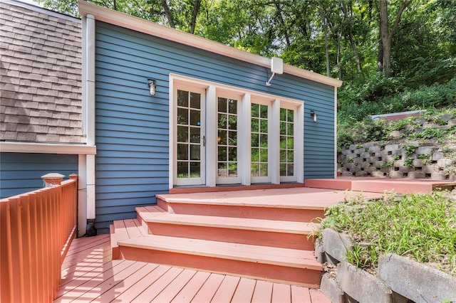 wooden deck featuring french doors