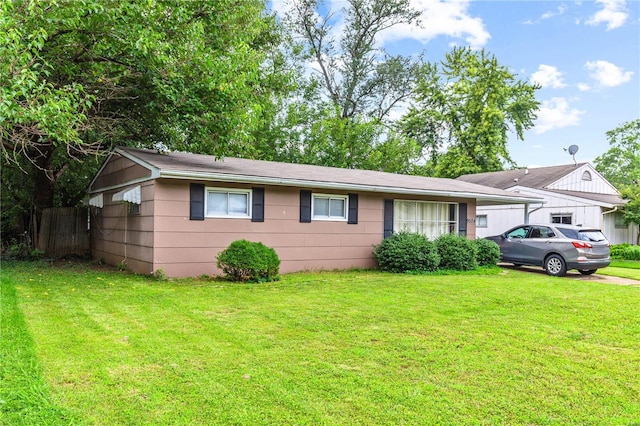 view of front of home with a front lawn