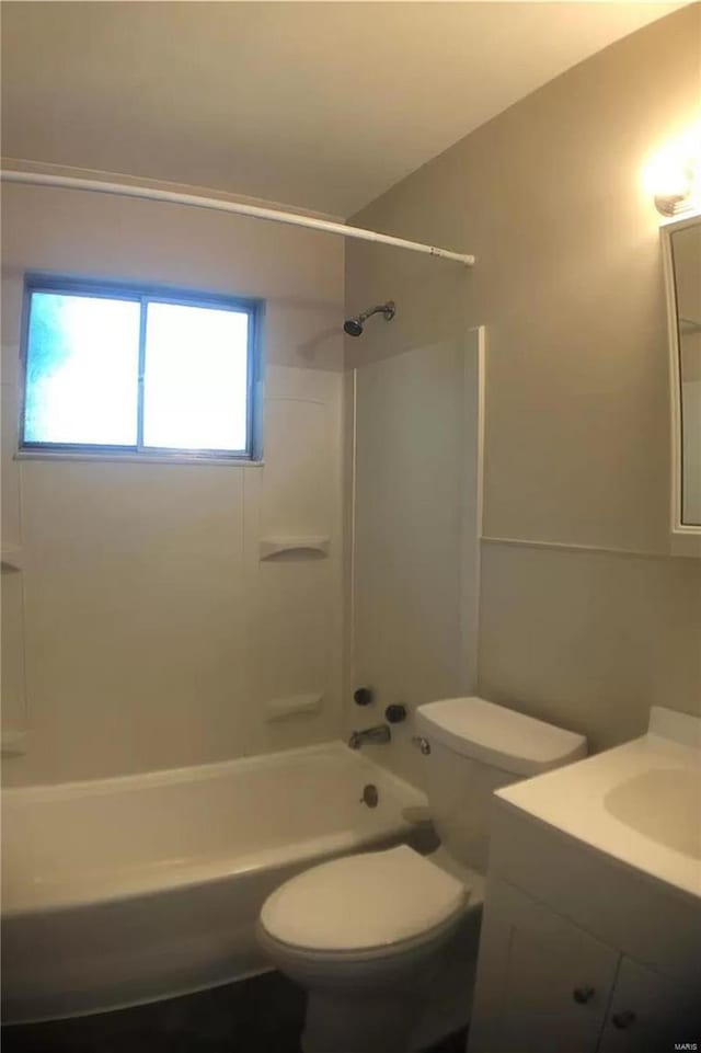 full bath with shower / bathing tub combination, vanity, and toilet