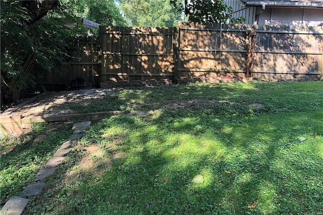 view of yard with fence