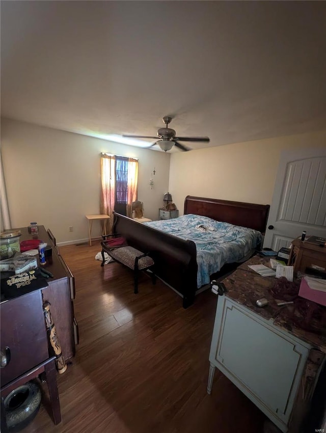 bedroom featuring wood-type flooring and ceiling fan