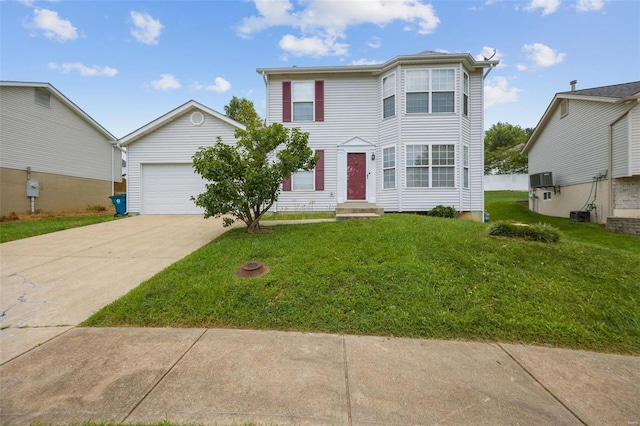 view of front of house with a front lawn and a garage