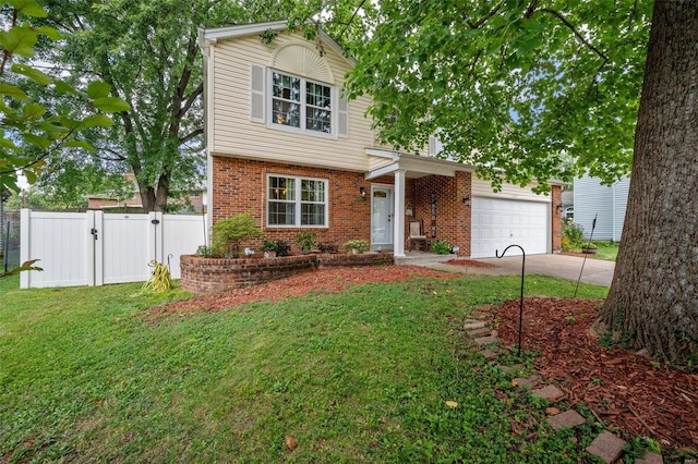 view of front of property featuring a front yard and a garage