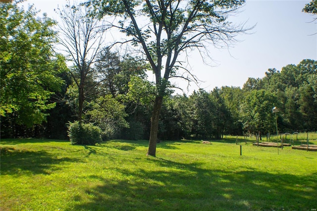 surrounding community featuring a lawn