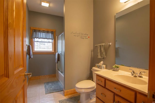full bath with toilet, enclosed tub / shower combo, tile patterned flooring, and vanity