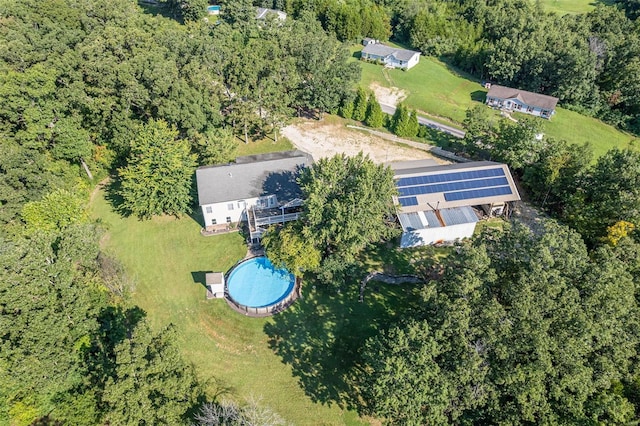 aerial view featuring a view of trees