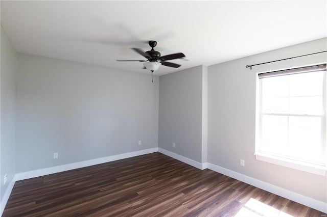 unfurnished room with wood-type flooring, a wealth of natural light, and ceiling fan