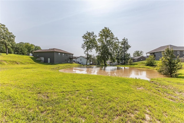 view of yard with a water view