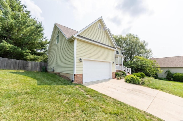 view of property exterior featuring a garage and a lawn