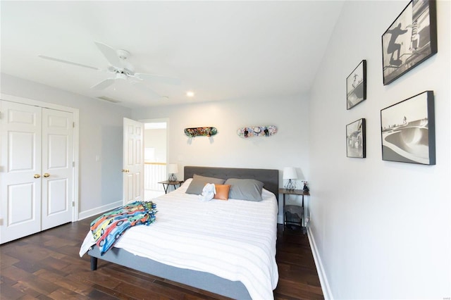 bedroom featuring dark wood-type flooring and ceiling fan