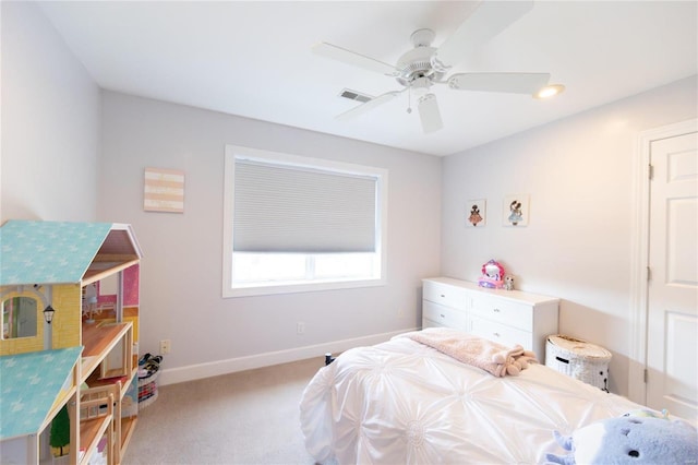 bedroom featuring light carpet and ceiling fan