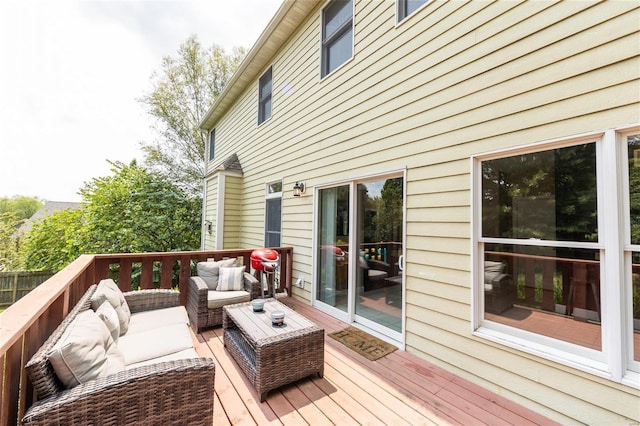 wooden deck featuring an outdoor hangout area