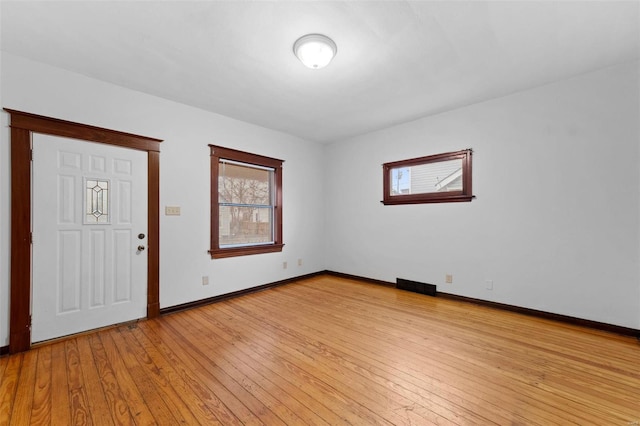 entrance foyer featuring light hardwood / wood-style floors