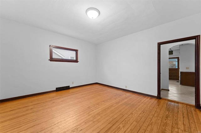 unfurnished room featuring light hardwood / wood-style flooring