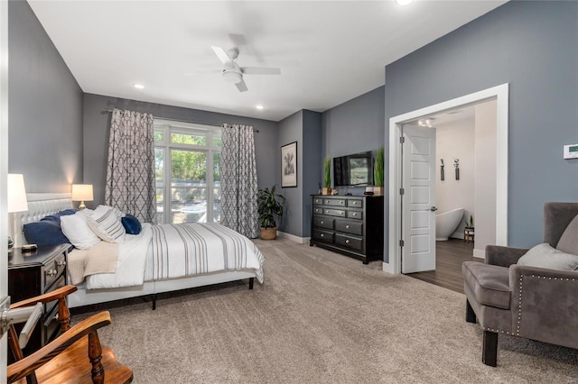 carpeted bedroom featuring ceiling fan