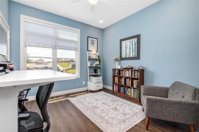 office area with hardwood / wood-style floors and ceiling fan