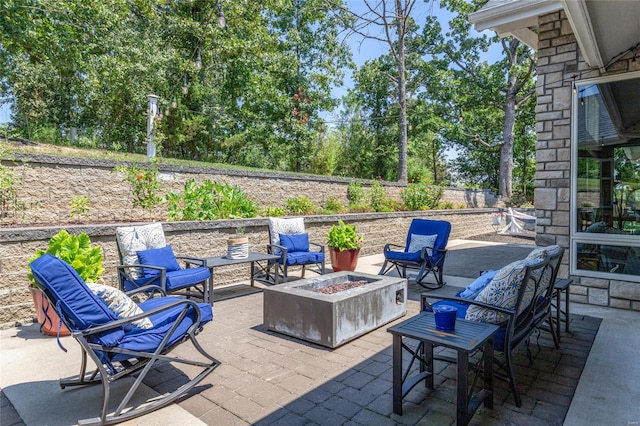 view of patio featuring a fire pit