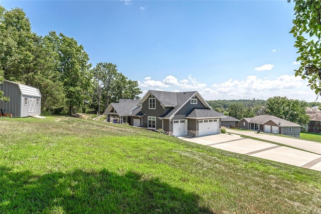 craftsman-style house featuring a front yard and a shed