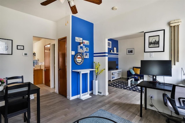 office area featuring wood-type flooring and ceiling fan