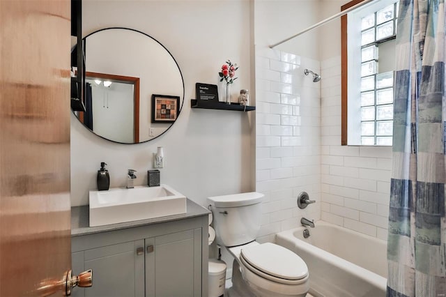 full bathroom featuring vanity, toilet, and shower / bath combo